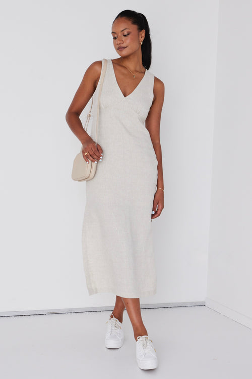 model wears linen v neck midi dress