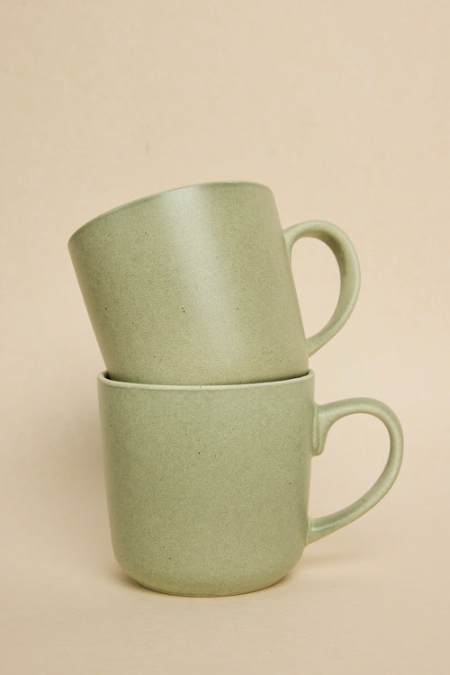 green coffee mug