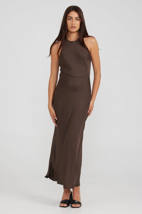 model wears a brown maxi dress