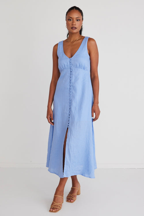 model is wearing a blue linen dress