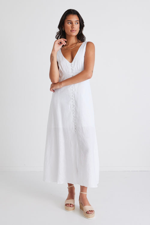 Model wears white linen sleeveless maxi dress