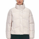 model wears a white puffer jacket