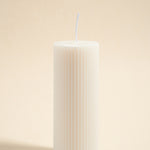 white ribbed candle