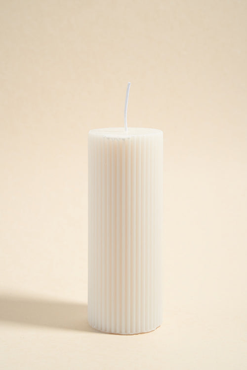 white ribbed candle