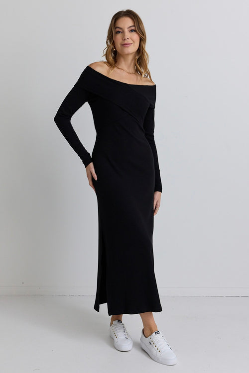 model wears a black off the shoulder maxi dress