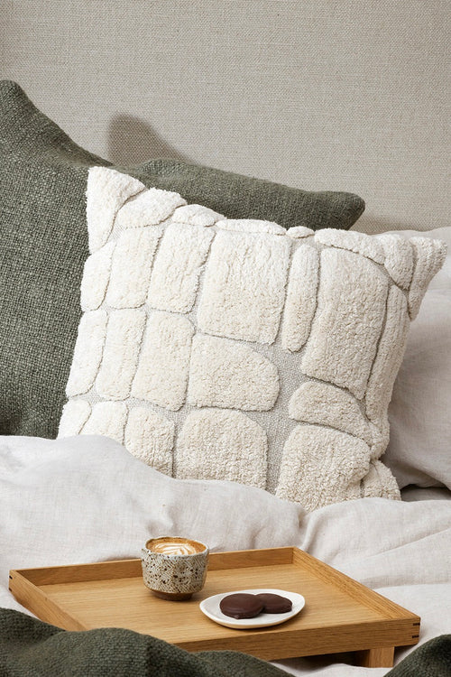 beige linen cushion